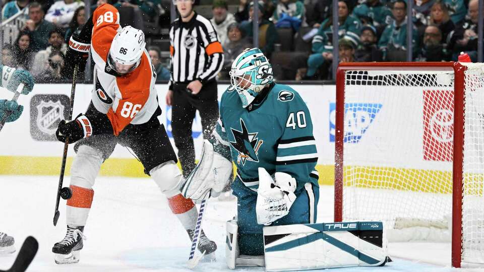 Philadelphia Flyers left wing Joel Farabee (86) attempts to score against San Jose Sharks goaltender Alexandar Georgiev (40) during the second period of an NHL hockey game Tuesday, Dec. 31, 2024, in San Jose, Calif.