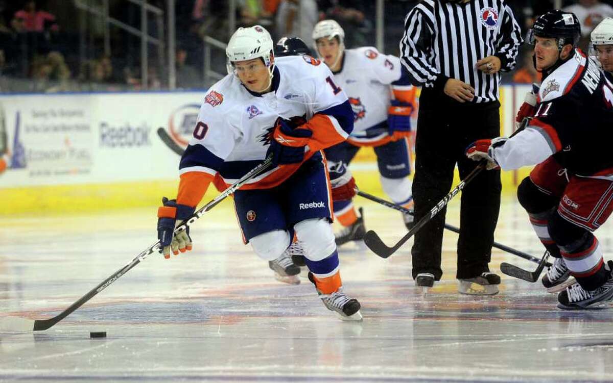 Rhett Rakhshani of the Soundtigers takes the puck toward the net during Saturday's game against the Hartford Wolf Pack at the Arena at Harbor Yard on November 6, 2010.