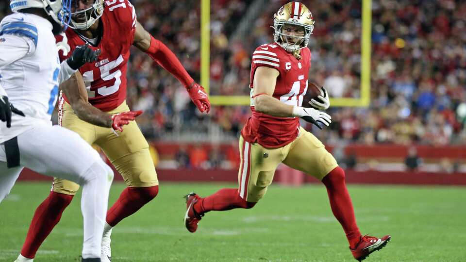 San Francisco 49ers’ Kyle Juszczyk runs after catch for a touchdown in 2nd quarter against Detroit Lions during NFL game at Levi’s Stadium in Santa Clara, Calif., on Monday, December 30, 2024.