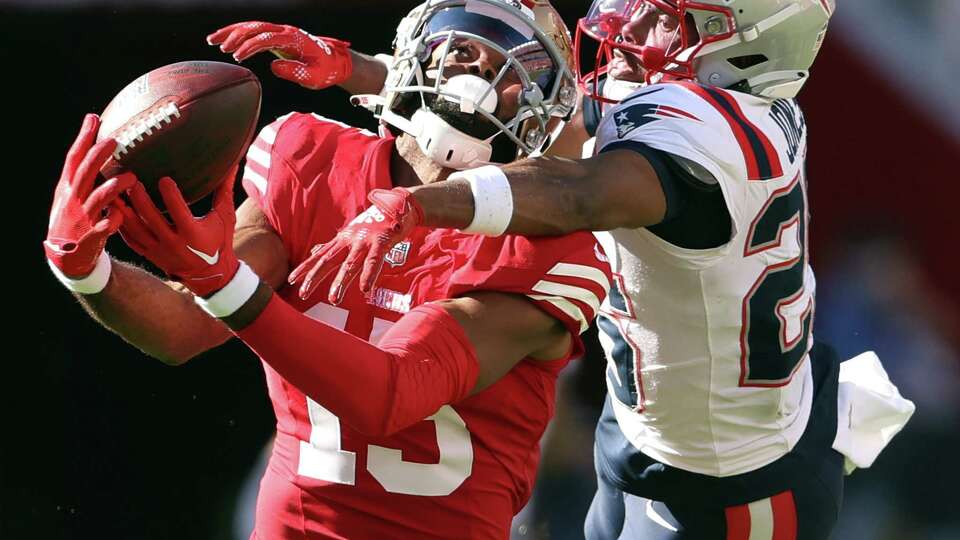 San Francisco 49ers’ Jauan Jennings catches a pass for a 45-yard gain against New England Patriots’ Marcus Jones in 4th quarter during NFL game at Levi’s Stadium in Santa Clara, Calif., on Sunday, September 29, 2024.