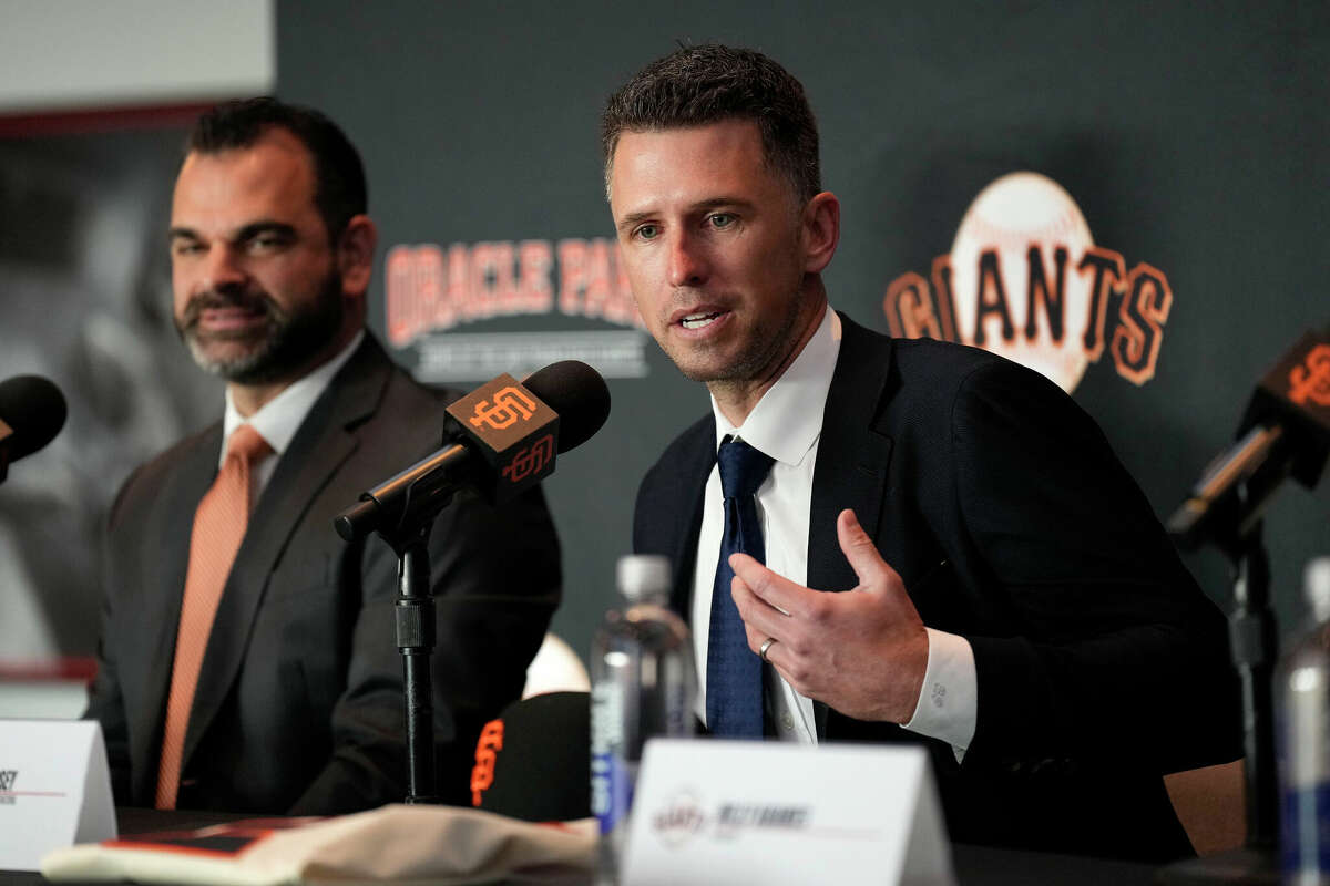 Buster Posey of the San Francisco Giants introduces Willy Adames during a press conference at Oracle Park on December 12, 2024 in San Francisco, California.