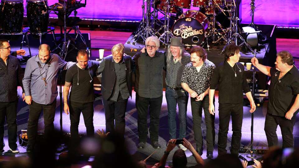 The Doobie Brothers stand on the stage at The Doobie Brothers at Ryman Auditorium, Monday, Nov. 18, 2019, in Nashville, Tenn.