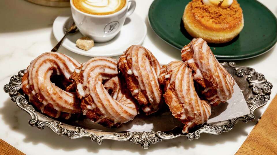 Crullers with vanilla glaze photographed at George?’s Donuts & Merriment in the West Portal neighborhood of San Francisco, Thursday, Jan. 2, 2025.