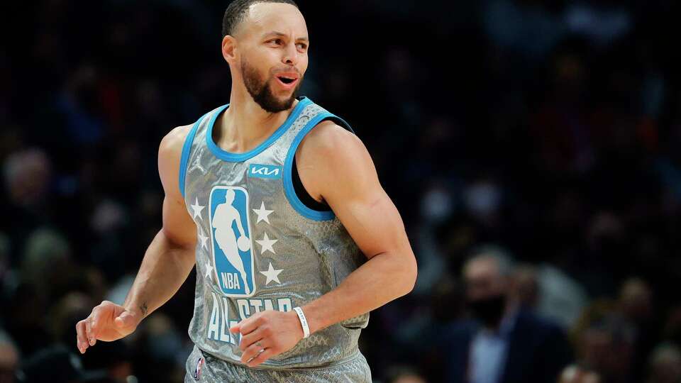 CLEVELAND, OHIO - FEBRUARY 20: Stephen Curry #30 of Team LeBron reacts after scoring in the fourth quarter against Team Durant during the 2022 NBA All-Star Game at Rocket Mortgage Fieldhouse on February 20, 2022 in Cleveland, Ohio. NOTE TO USER: User expressly acknowledges and agrees that, by downloading and or using this photograph, User is consenting to the terms and conditions of the Getty Images License Agreement.