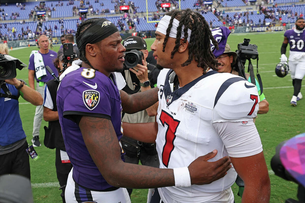 BALTIMORE, MARYLAND - SEPTEMBER 10: Lamar Jackson #8 of the Baltimore Ravens and C.J. Stroud #7 of the Houston Texans meet on the field after the Ravens 25-9 win at M&T Bank Stadium on September 10, 2023 in Baltimore, Maryland. (Photo by Patrick Smith/Getty Images)