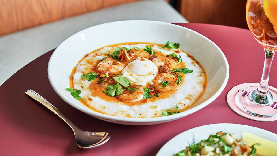 ONE TIME USE ONLY FOR Jan25EB0106. Curry shrimp and congee is one of the offerings at Oakland's new brunch restaurant the Peach