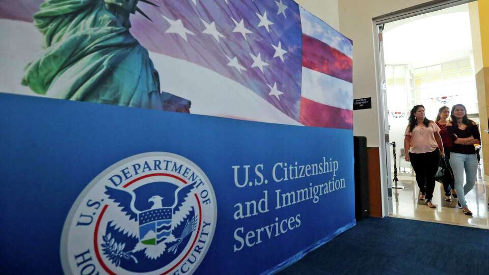 In this?Aug. 17, 2018, file photo, people arrive before the start of a naturalization ceremony at the U.S. Citizenship and Immigration Services Miami Field Office in Miami. The number of applications for visas used in the technology industry soared for a second straight year, raising ?serious concerns? that some are manipulating the system to gain an unfair advantage, authorities said Friday. There were 780,884 applications for H-1B visas in this year's computer-generated lottery, up 61% from 483,927 last year, U.S. Citizenship and Immigration Services said in a message to ?stakeholders.?