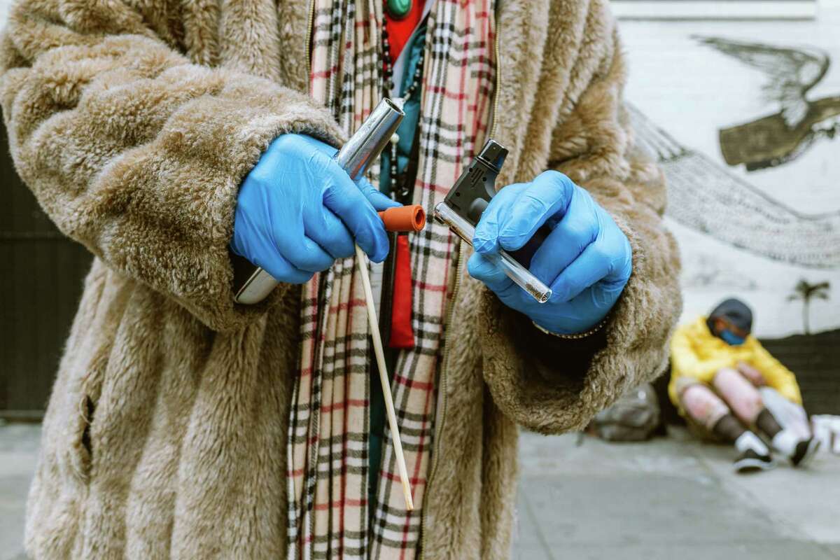 Stephon D. Fowler Sr gets his crack pipe ready on 6th and Mission street in San Francisco, Calif., on Thursday, May. 25th, 2023. Drug users, dealers, and merchants speak out on City Hall's crackdown on open-air drug markets.