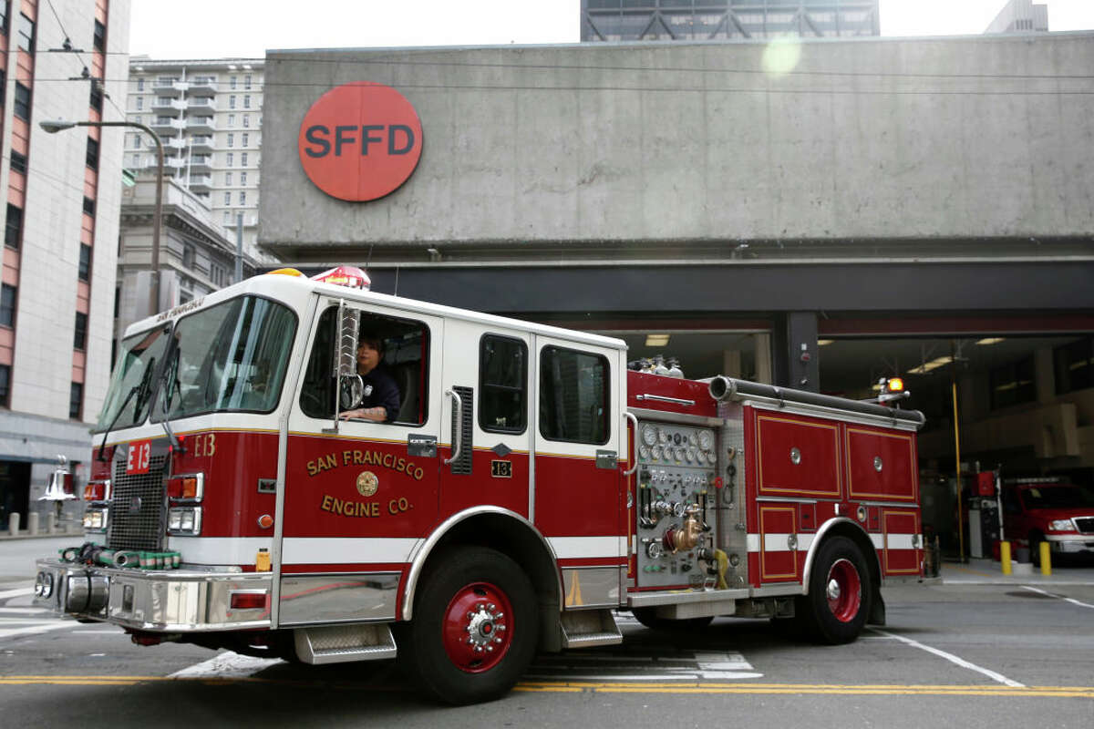 FILE: Firefighter Willa Ortega backs the fire engine into Station 13 on Sansome Street in San Francisco, Calif. on Saturday, April 22, 2017. 