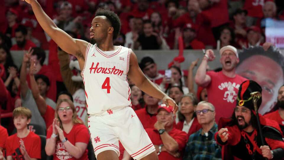 Houston guard L.J. Cryer (4) hits a 3-pointer during the second half of a Big 12 men’s basketball game on Saturday, Jan. 4, 2025, in Houston.