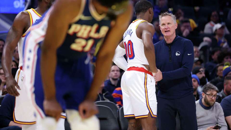 Golden State Warriors’ head coach Steve Kerr talks with Jonathan Kuminga in 1st quarter against Philadelphia 76ers during NBA game at Chase Center in San Francisco on Thursday, January 2, 2025.