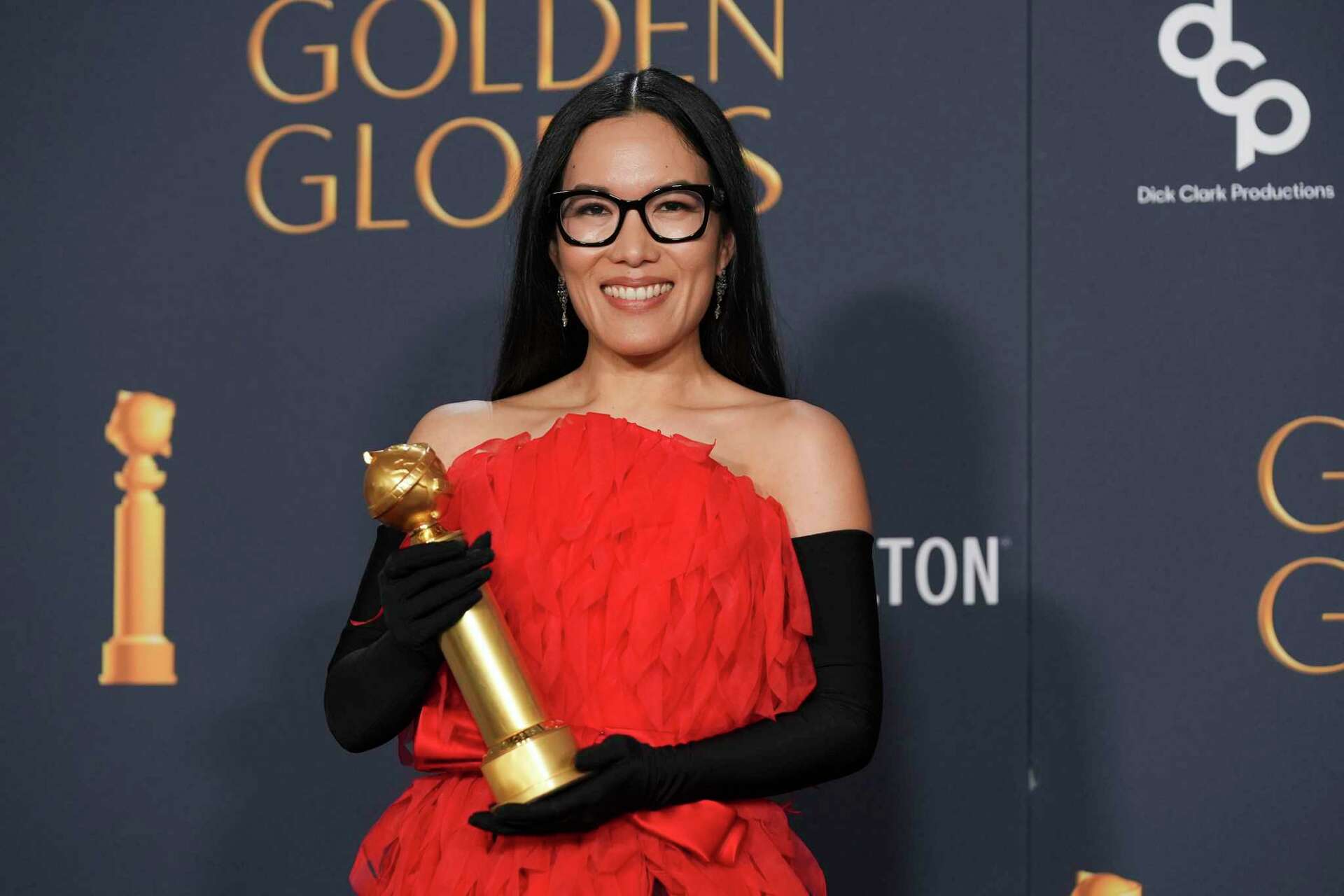 ali wong red dress The first  I've ever received for a stand up special    Dress,  gloves and shoes: @balenciaga Earrings: @bpdesilvajewellers Styling:  @taraswennen Makeup: @danielmartin Hair: @samiknighthair  @goldenglobes  @gettyimages #goldenglobes