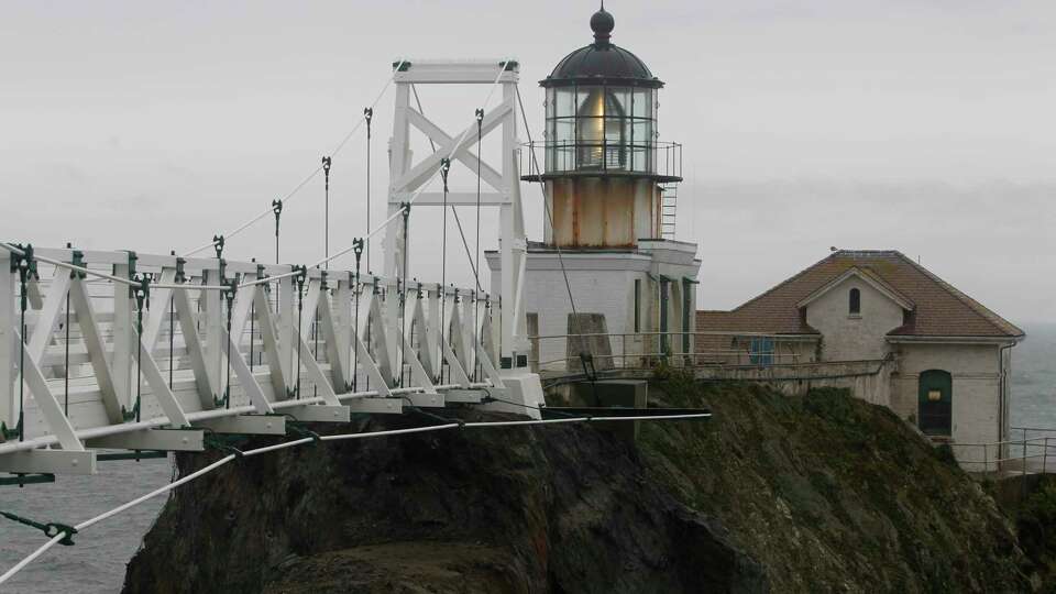 The reconstructed suspension foot bridge leads to the Point Bonita lighthouse in Sausalito, Calif. on Tuesday, April 10, 2012. The lighthouse reopens to the public this weekend.