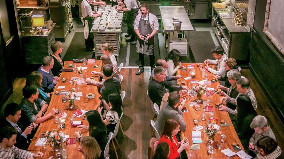 Chef David Barzelay talks with diners before dinner at Lazy Bear in San Francisco, Calif. on December 13th, 2014.