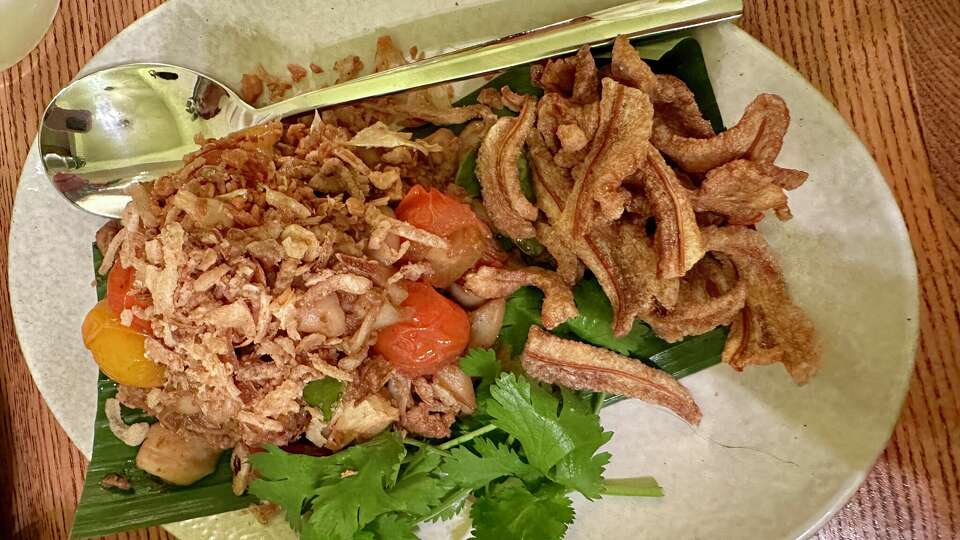 Tom khanoon with stir-fried jackfruit and pork rinds at Tanzie's in Berkeley.