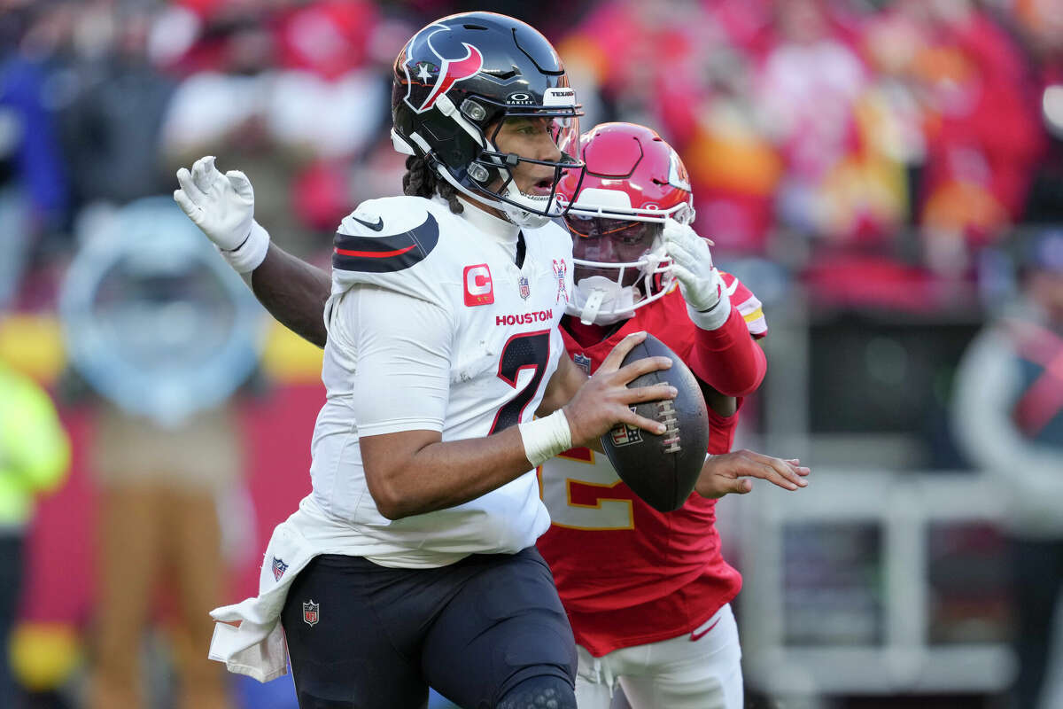 KANSAS CITY, MISSOURI - DECEMBER 21: Joshua Williams #2 of the Kansas City Chiefs sacks C.J. Stroud #7 of the Houston Texans in the fourth quarter of a game at GEHA Field at Arrowhead Stadium on December 21, 2024 in Kansas City, Missouri. (Photo by Jason Hanna/Getty Images)