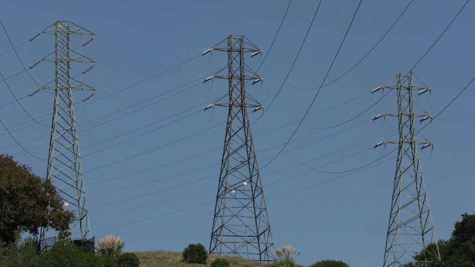 Power transmission lines in in the Oakland hills in Oakland, Calif. on Wednesday, September 7, 2022.