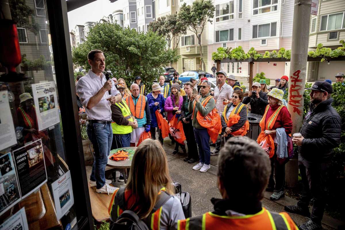 San Francisco Mayor-elect Daniel Lurie addresses the crowd outside Ocean Beach Cafe during Ocean Beach Cleanup in the Outer Richmond neighborhood of San Francisco, Saturday, Jan. 4, 2025.