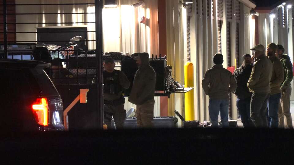 FBI Houston and the Harris County Sheriff's Office search a storage unit on Walters Road Monday night, Jan. 6, 2024.