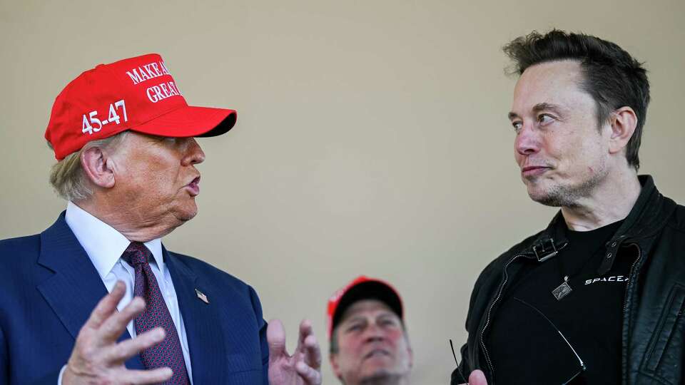 Elon Musk, right, speaks with President-elect Donald Trump at a viewing of the launch of the sixth test flight of the SpaceX Starship rocket on Nov. 19, 2024, in Brownsville, Texas.