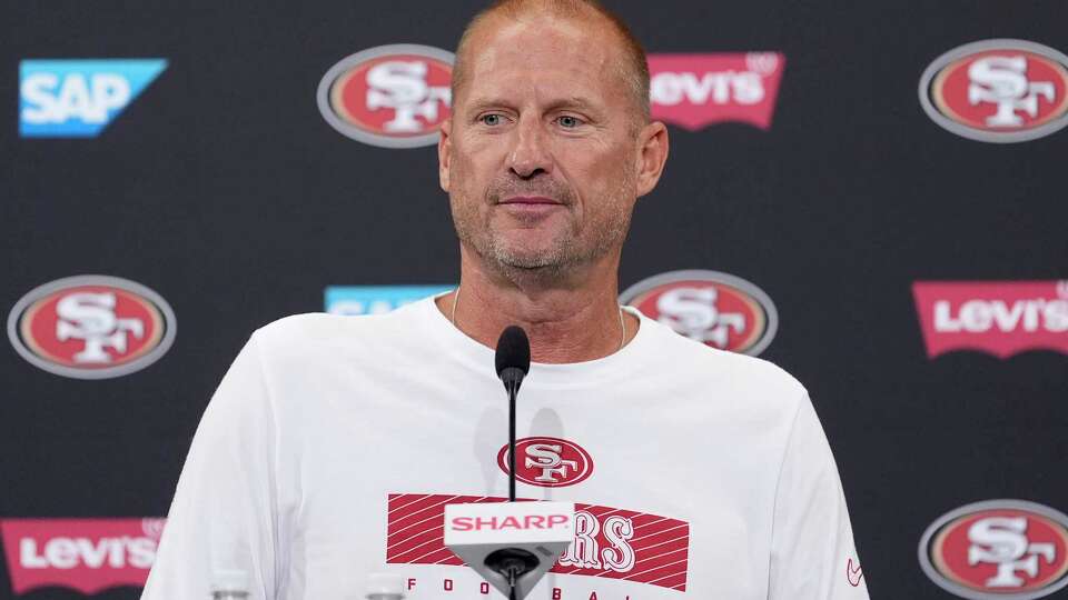 FILE - San Francisco 49ers special teams coordinator Brian Schneider speaks at a news conference during NFL football training camp in Santa Clara, Calif., July 30, 2024. (AP Photo/Jeff Chiu, File)