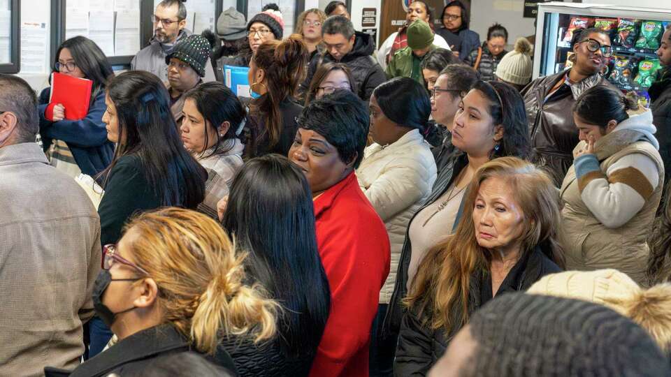 Visitors pack the hallway and entrance to Harris County Southwest Courthouse Annex 19 as landlords, tenants and attorneys prepare to appear before Justice of the Peace Court Precinct 5, Place 1 Judge James Lombardino Tuesday, Jan. 7, 2025 in Houston.