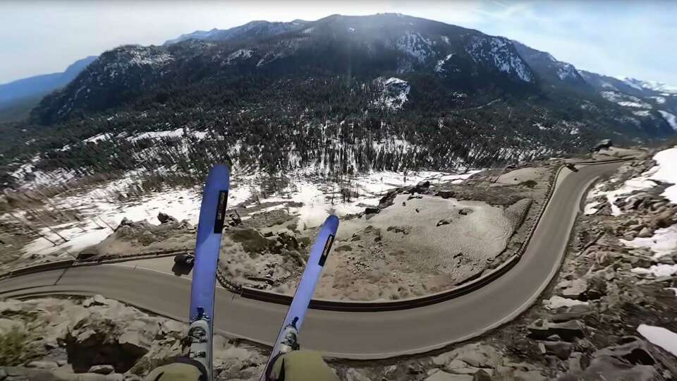 Scenes from professional freeskier Josh Daiek's outrageous ski-BASE jump over Highway 50 near South Lake Tahoe.