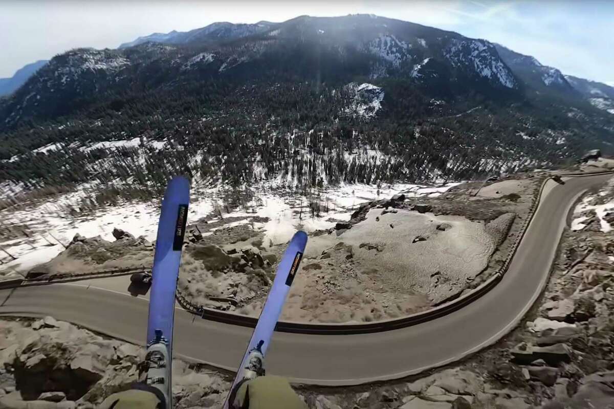 Scenes from professional freeskier Josh Daiek's outrageous ski-BASE jump over Highway 50 near South Lake Tahoe.