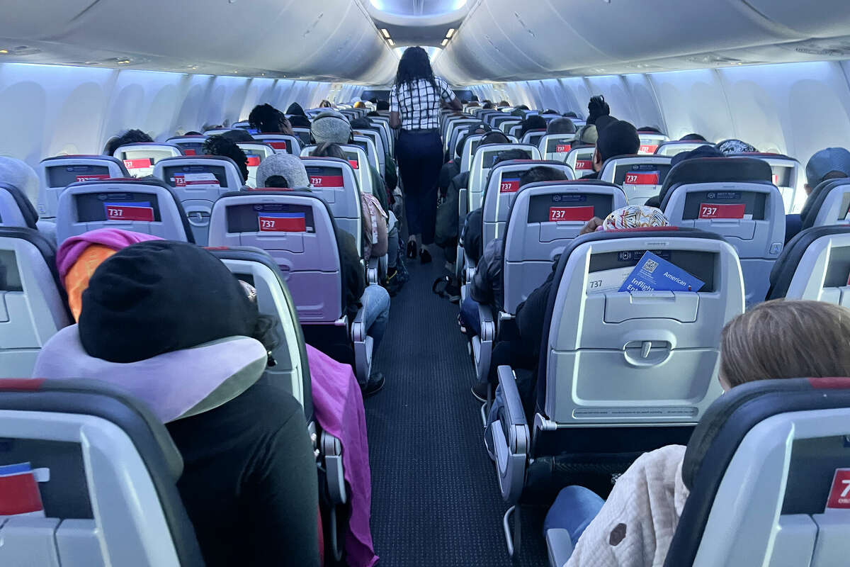 People fly an American Airline plane from the Hartsfield-Jackson Atlanta International Airport to the Miami International Airport on October 25, 2024 in Miami, Florida. 