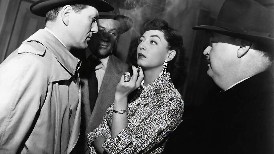 Marie Windsor caught between a rock (Charles McGraw, left) and a hard place (Paul Maxey) in Richard Fleischer's 'The Narrow Margin' (1952).