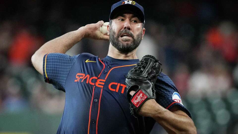 Houston Astros starting pitcher Justin Verlander (35) pitches during the first inning of an MLB game Monday, June 3, 2024, at Minute Maid Park in Houston.