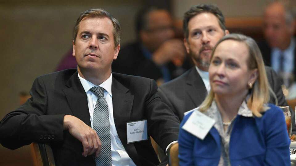 Supreme Court justices Jimmy Blacklock, left, Jeff Boyd and Jane Bland listen during the Texas Access to Justice Foundation Luncheon with the Supreme Court of Texas in Austin on Tuesday, Oct. 25, 2022. Former Supreme Court Justice Eva Guzman was honored with the Harold F. Kleinman award, and Sen. Joan Huffman, Sen. Judith Zaffirini and Rep. Mary Gonzalez each received Legislative Heroes awards.