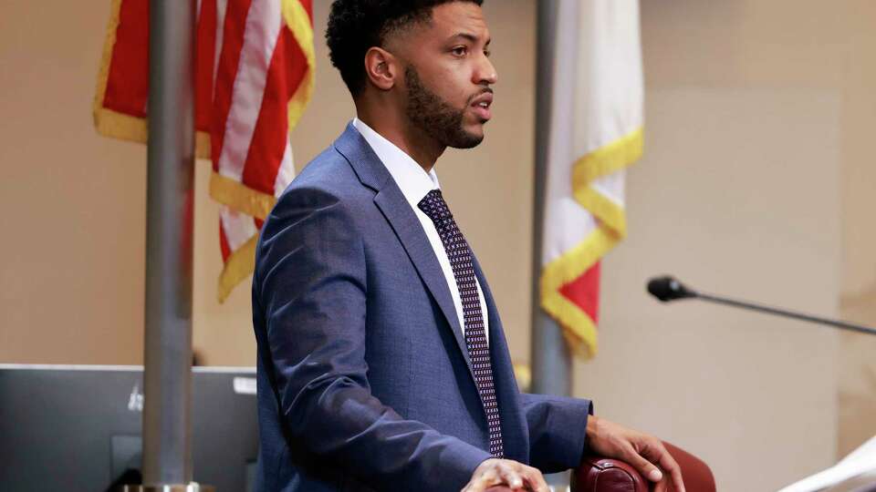 Oakland District 6 Council Member Kevin Jenkins prepares to be seated ahead of a city council meeting held at the Oakland City Hall Council Chambers in Oakland, California Monday, Jan. 6, 2025.