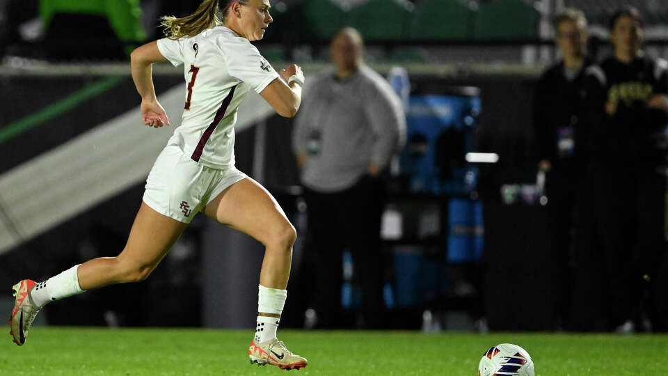 Taylor Huff #3 of the Florida State Seminoles dribbles against the Clemson Tigers in the first half during the semifinals round at Wake Med Soccer Park on December 01, 2023 in Raleigh, North Carolina. 