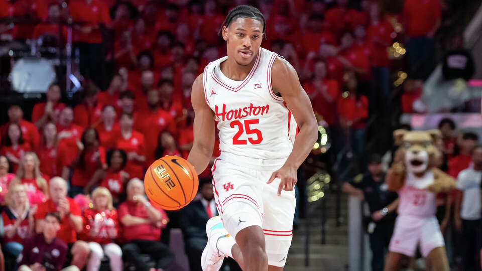 Mercy Miller #25 of the Houston Cougars dribbles the ball in a game against the Texas A&M Aggies at Fertitta Center on October 27, 2024 in Houston, Texas. (Photo by Joe Buvid/Getty Images)