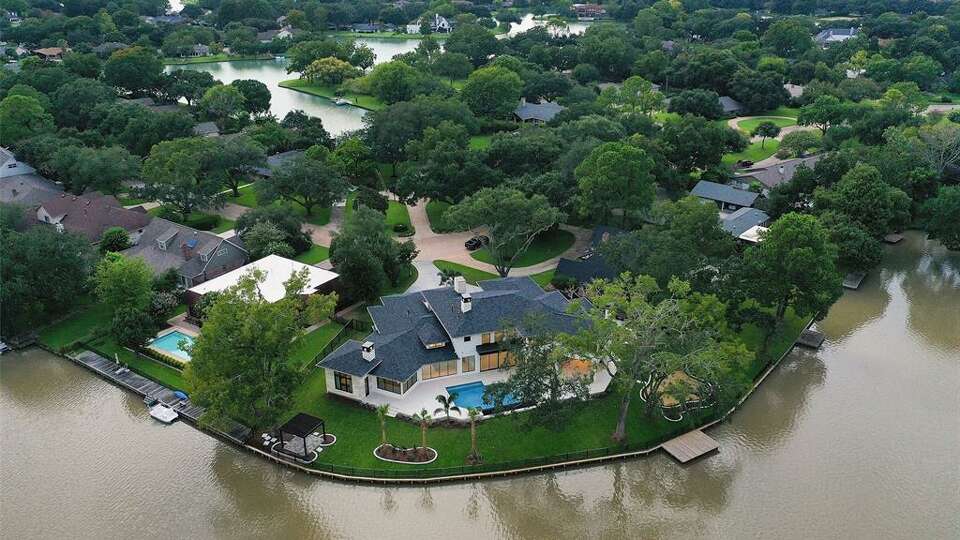 415 Lombardy Drive overlooks Eldrige Lake in Sugar Land.