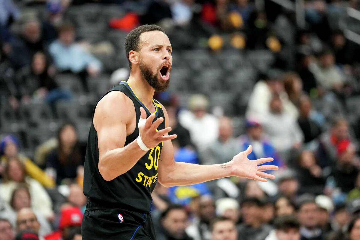 Stephen Curry of the Golden State Warriors reacts during the first quarter against the Detroit Pistons at Little Caesars Arena on January 09, 2025 in Detroit, Michigan.