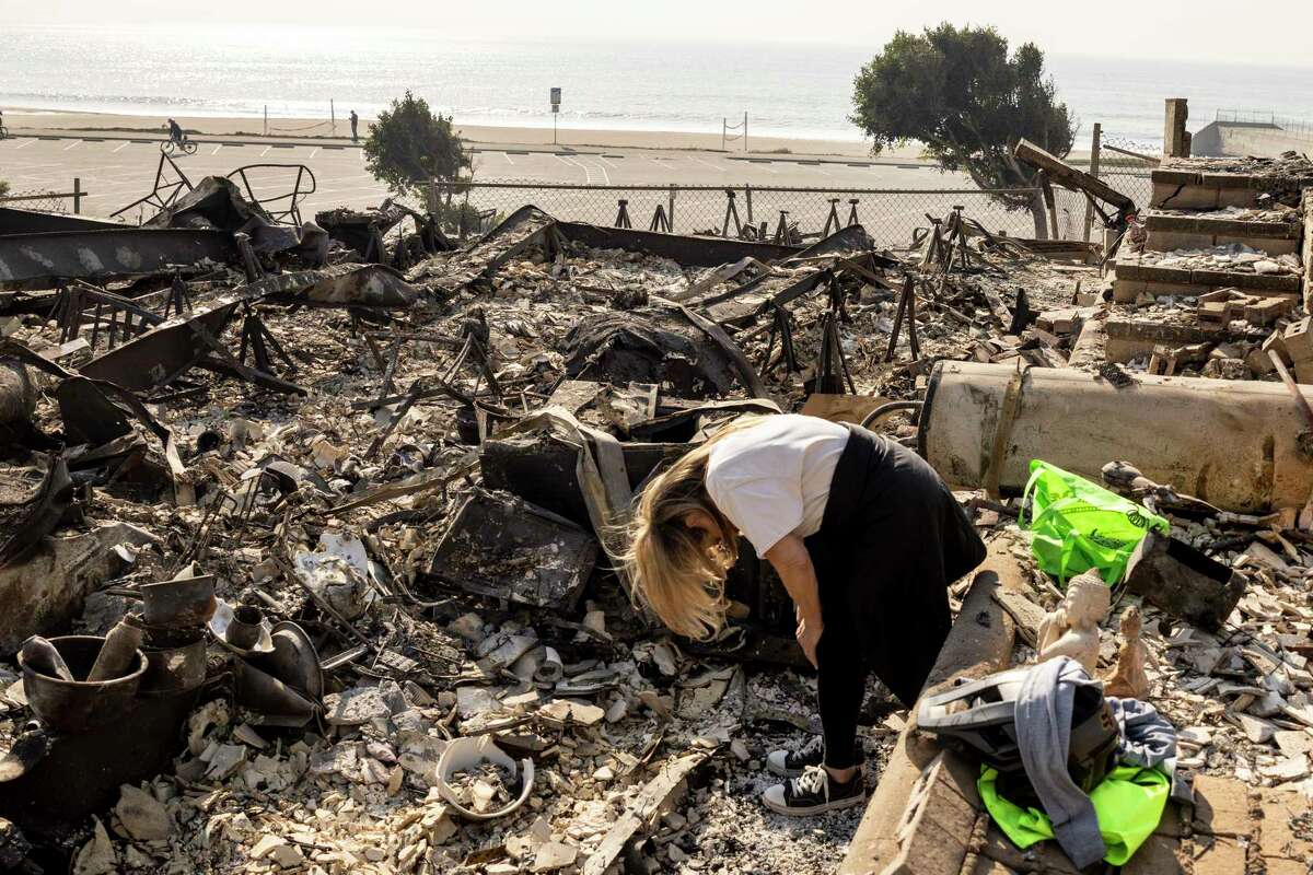 A home destroyed by the Palisades Fire is seen on Thursday. 