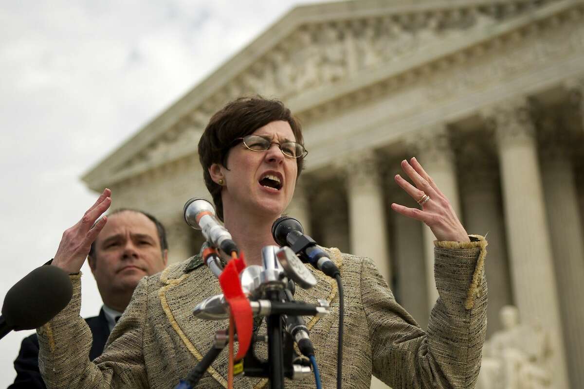 WASHINGTON - MARCH 2: Ann Beeson, associate legal director of the ACLU, and Mark Segal, of the Philadelphia Gay News, address media outside of the U.S. Supreme Court March 2, 2004 in Washington, DC. The ACLU argued an internet censorship case, against U.S. Attorney General John Ashcroft, concerning a law that they say unconstitutionally blocks lawful and valuable speech for adults on the Web while failing in its aim to safeguard minors from sexually explicit material online. (Photo by Brendan Smialowski/Getty Images)