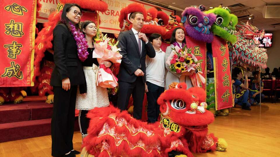 (From left to right) Chyanne Chen, her daughter, Mayor Daniel Lurie, Connie Chan and her son pose for a photo at Far East Cafe in San Francisco on Friday, Jan. 10, 2025. The Chinatown banquet celebrated District 1 reelected supervisor Connie Chan and District 11 supervisor-elect Chyanne Chen, both of whom were elected by the slimmest of margins. They now are the only Chinese and Asian American supervisors in San Francisco.