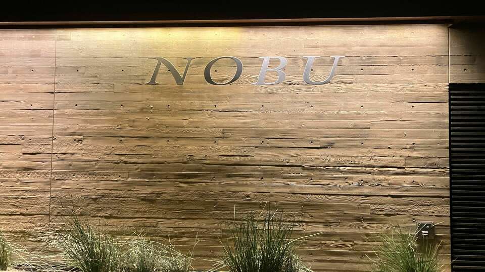 Nobu, a famous sushi restaurant in Malibu, is still standing but temporarily closed amidst the Los Angeles wildfires.