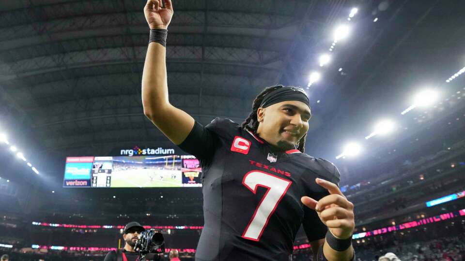 Houston Texans quarterback C.J. Stroud celebrates as he runs off the field after the Texans 32-12 win over the Los Angeles Chargers in an AFC Wild Card football game, Saturday, Jan. 11, 2025, in Houston.