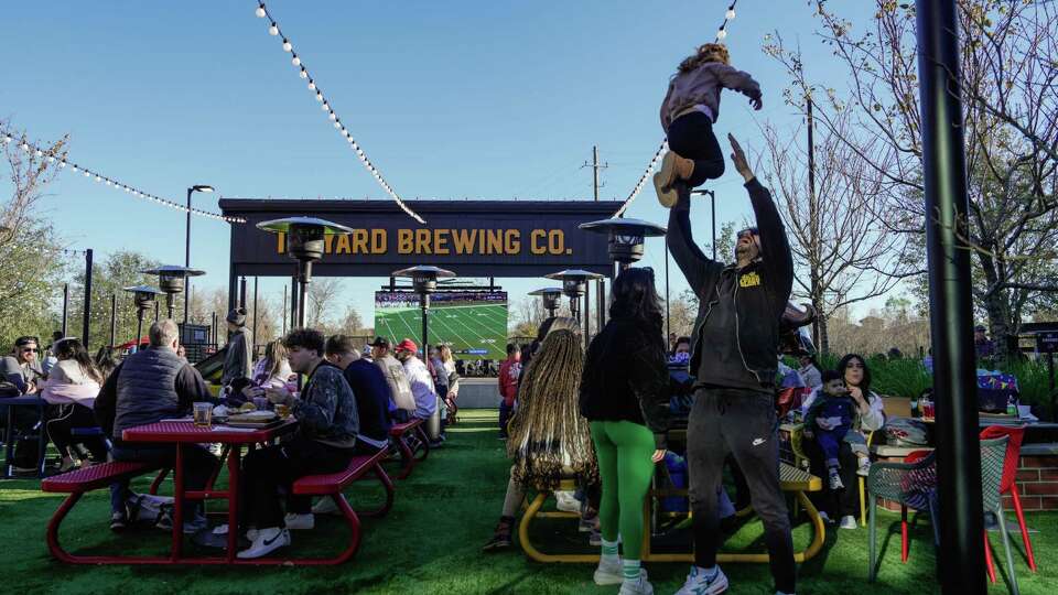 People watch sports with friends and family at Talyard Brewing Co. on Saturday, Jan. 11, 2025 in Sugar Land.