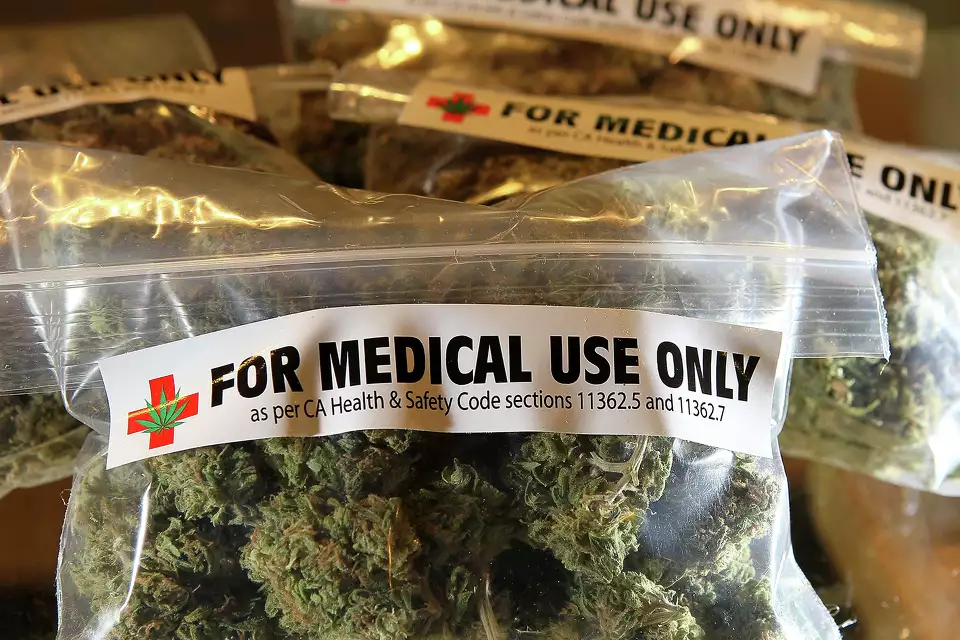 FILE: One-ounce bags of medical marijuana are displayed at the Berkeley Patients Group on March 25, 2010, in Berkeley, Calif.