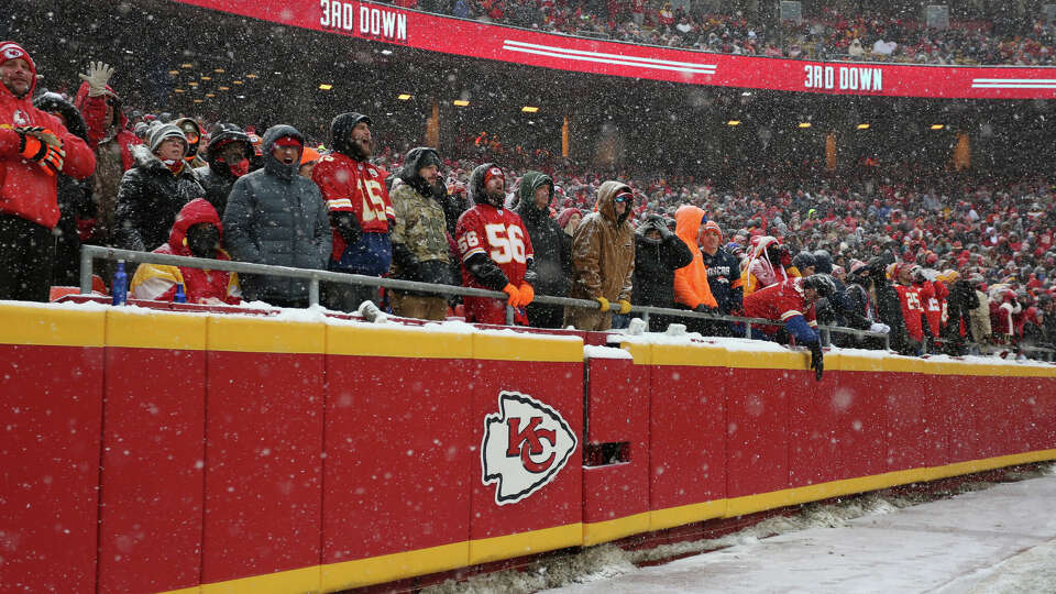 Kansas City Chiefs fans line the stadium during a cold, snowy day in the second quarter of an AFC West game between the Denver Broncos and Kansas City Chiefs on December 15, 2019 at Arrowhead Stadium in Kansas City, Missouri