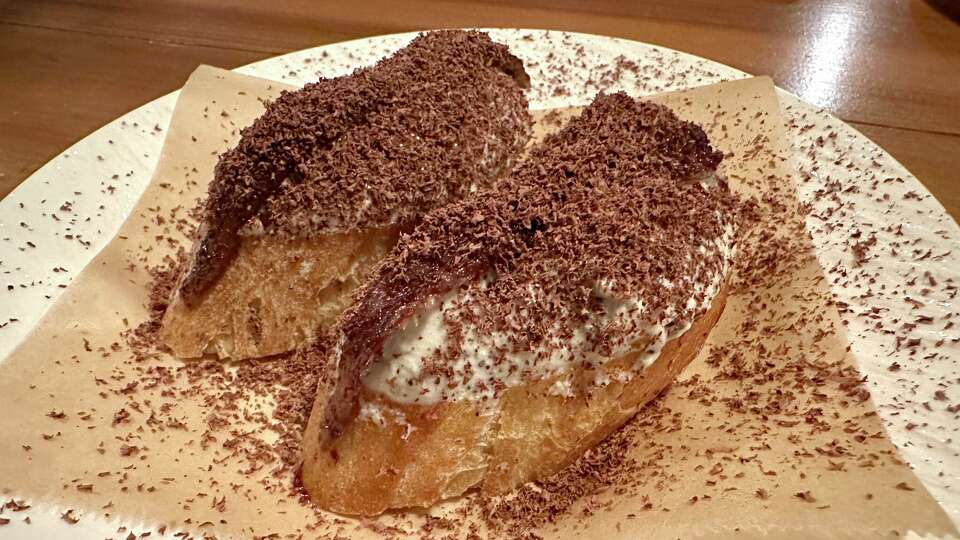 Bread topped with truffled ricotta, anchovies and unsweetened chocolate at Binu Bonu in San Francisco