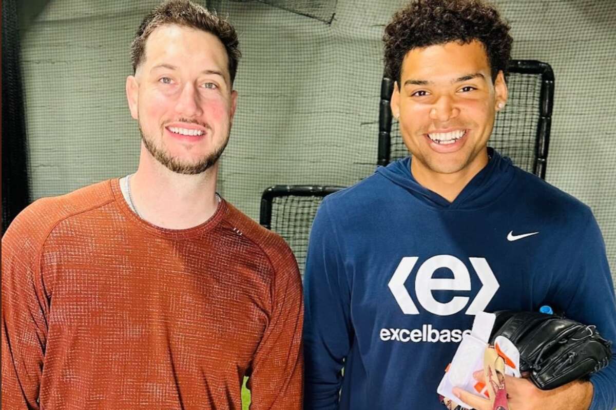 Houston Astros top prospect Cam Smith poses with former Astros outfielder Kyle Tucker.