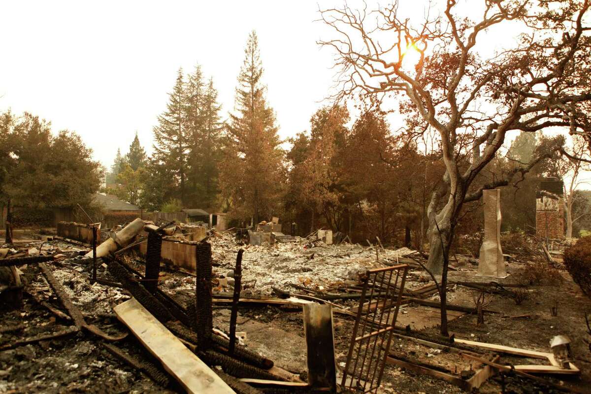 A home destroyed by the Atlas Fire is seen near the intersection of Inverness and Hillcrest Drive in Napa, Ca. on Wednesday, October 11, 2017.