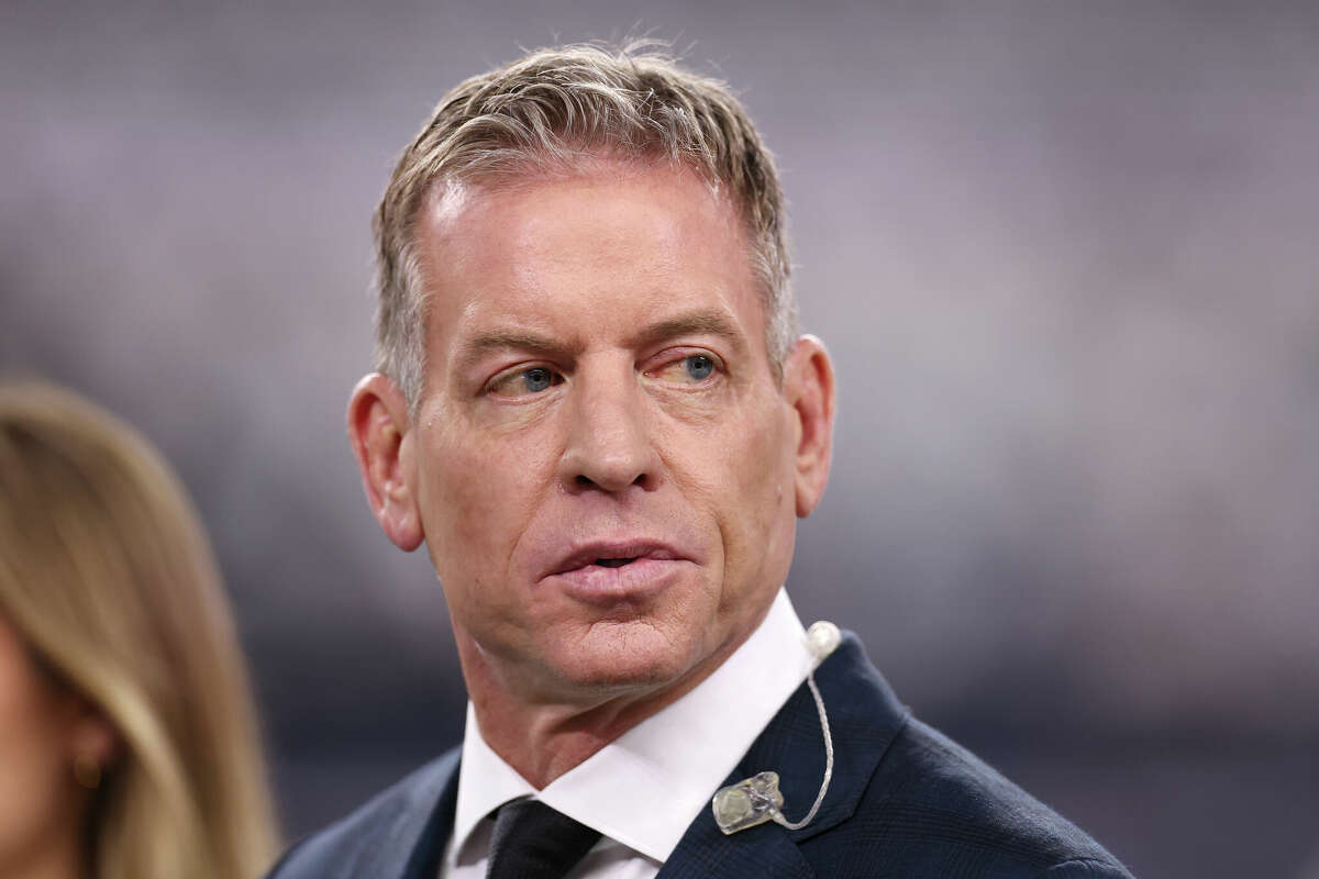 ESPN broadcast Troy Aikman looks on prior to the game between the Dallas Cowboys and the Houston Texans at AT&T Stadium on November 18, 2024 in Arlington, Texas. 