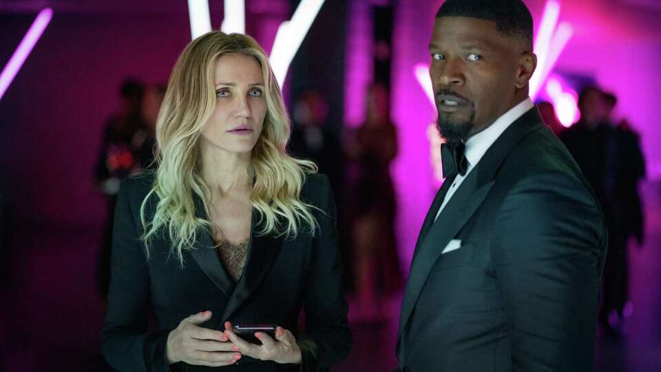 Cameron Diaz as Emily, left, and Jamie Foxx as Matt in 'Back In Action.'